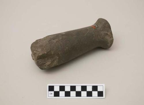 Large stone hand hammer, partly broken. Flat topped kind, low base.