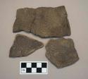 4 curvilinear complicated stamped body sherds; fiber-tempered. 26A(I), no vessel #  2 are cross meneded