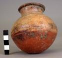 Pottery jar, base red, upper zone white with black ornamentation