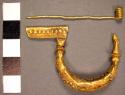 Etruscan gold leech-shaped fibula with granulated work