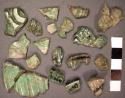 11 fragments of jade plaque (5 assembled, 6 loose)