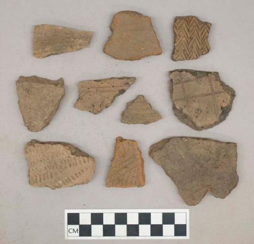 Ceramic, earthenware, body and rim sherds including punctate and incised decoration