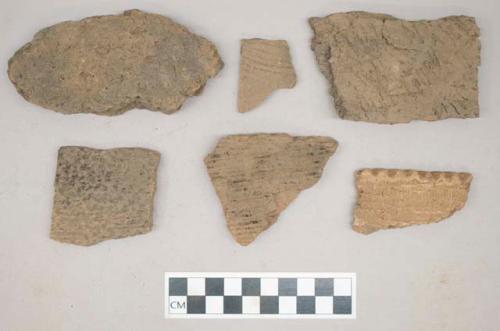 Ceramic, earthenware, body and rim sherds including incised and impressed decoration