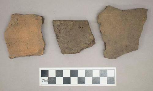 Ceramic, earthenware, body and rim sherds including punctate and impressed decoration