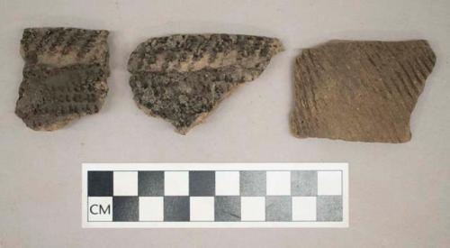 Ceramic, earthenware, body and rim sherds including punctate and impressed decoration