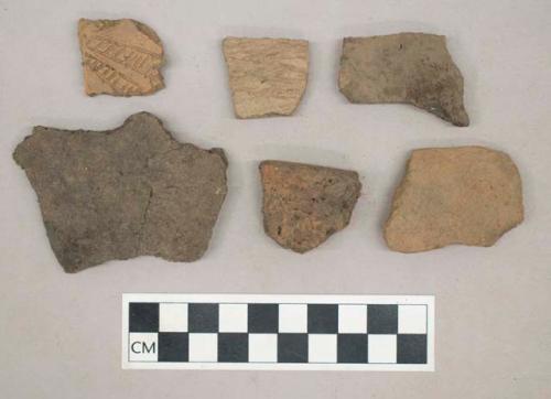 Ceramic, earthenware, body and rim sherds including incised and impressed decoration