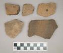 Ceramic, earthenware, body and rim sherds with dentate, incised, and impressed decoration, some are perforated