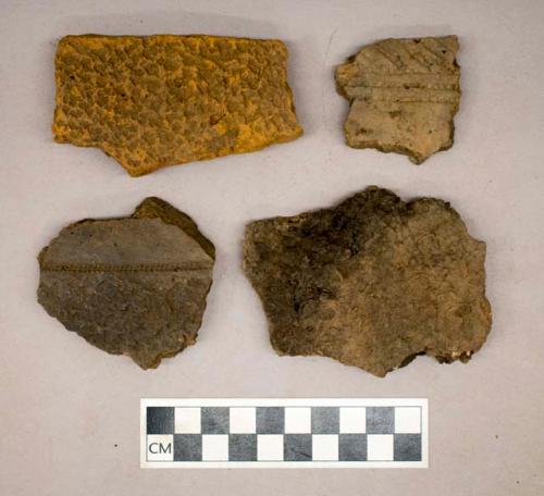 Ceramic, earthenware, body and rim sherds including punctate and impressed decoration