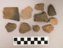 Ceramic, earthenware, body and rim sherds with impressed decoration, some are perforated