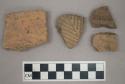 Ceramic, earthenware, body and rim sherds with punctate, incised, and impressed decoration