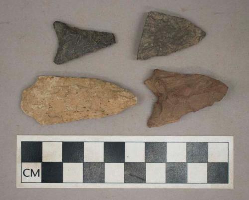 Chipped stone, triangular with concave base, stemmed, and broken lanceolate bifaces