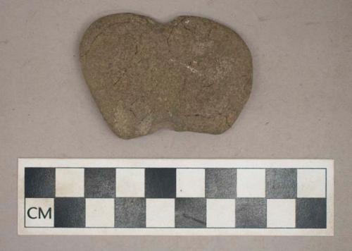 Ground stone, side-notched, possible weight