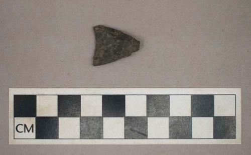 Chipped stone, concave base, triangular biface