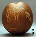 Calabash vessel for drinking water - even used as general food dish with carved
