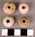 Shell objects, resembling small spindle whorls