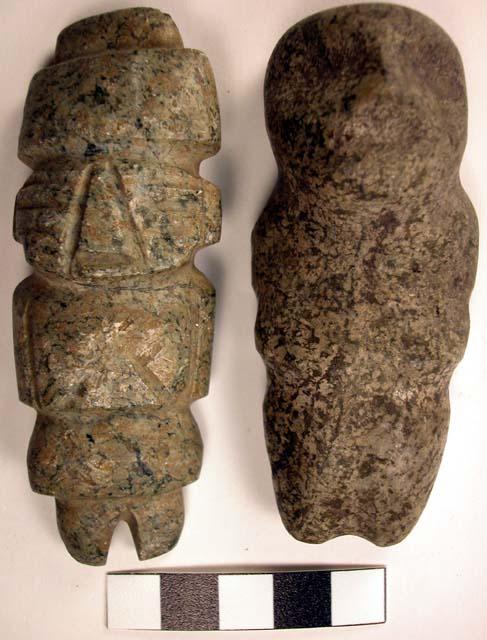 2 stone figurines