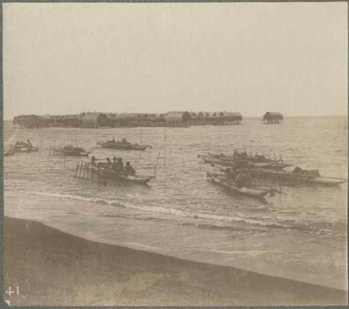 Boats, with pile dwellings in background