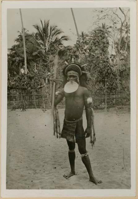 Man of chiefly descent dressed for hunting or fighting