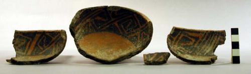 Ceramic bowl, partial, from ladle, black on orange decoration