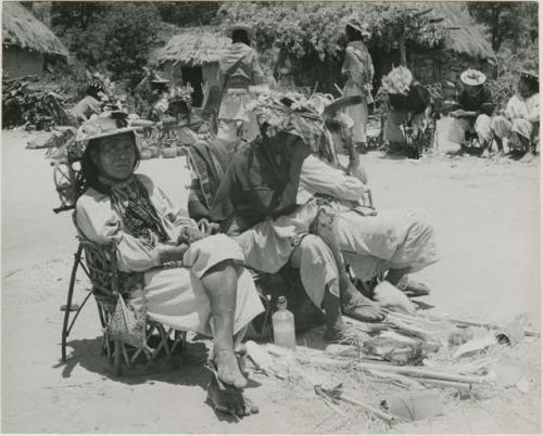 Singing Shaman (center) and his two assistants chant the details of 43-day peyote pilgrimage