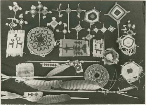 Collection of "eyes," "namas," prayer arrows, and god stoolets