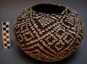 Round basket decorated with small shell discs, 9.5 inches diameter. has been co
