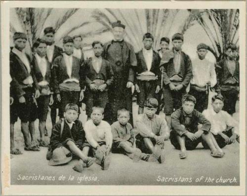 Group photograph of sacristans of a church in Chichicastenango