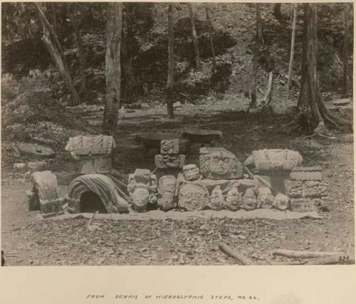 Sculptures from debris of hieroglyphic steps, Mound 26