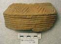 Ceramic rim sherd, shoulder, impressed design