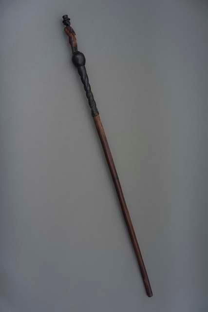 Wooden effigy walking stick