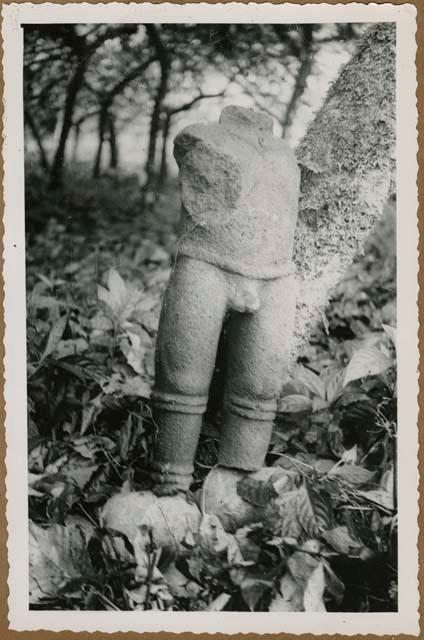 Torso of stone figure at Las Mercedes