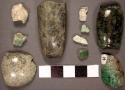 785 mixed jade spheroid and tubular bead fragments