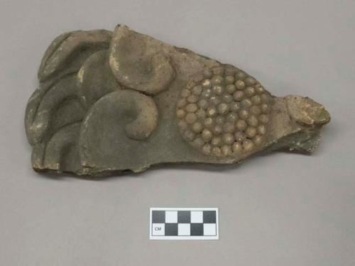 Fragment of cast of decorative design