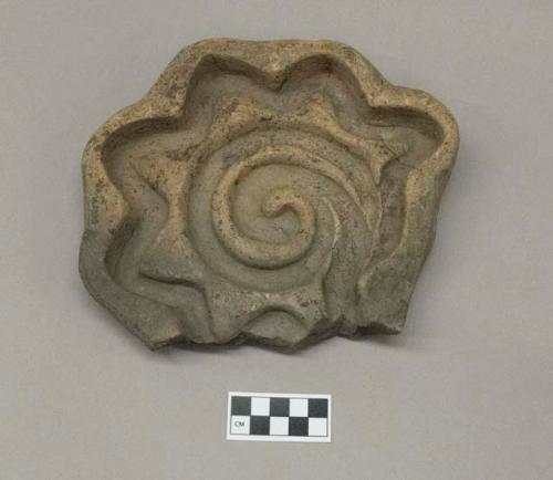 Pottery mold, star pointed scroll