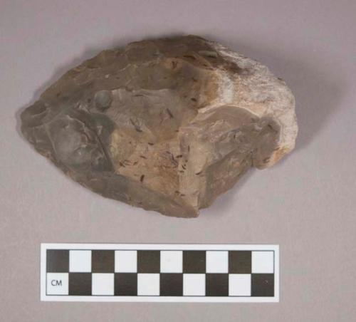 Flint fist axe showing effect of thermal fracture