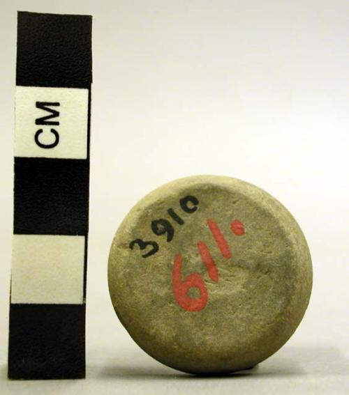 Small disc of stone