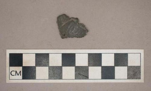 Ground stone, perforated pendant fragment