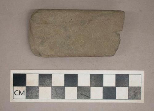 Ground stone, sharpening stone fragment