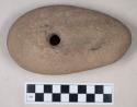 Ground stone, perforated, possible hammerstone