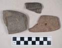 Ground stone, perforated atlatl weight, gorget, and pendant fragments