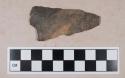 Chipped stone, convex base, triangular biface fragment