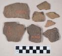 Ceramic, earthenware, body and rim sherds with punctate, incised, and impressed decoration