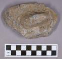 Ground stone, soapstone vessel fragment with handle