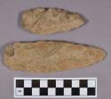 Chipped stone, bifaces, lanceolate and stemmed projectile points, and an edged tool