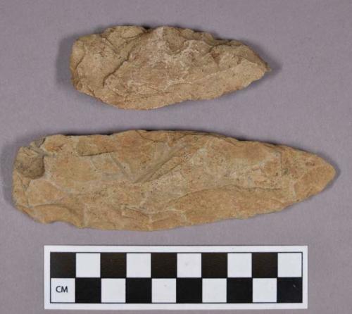 Chipped stone, bifaces, lanceolate and stemmed projectile points, and an edged tool