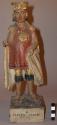 Wood and gesso polychrome figure, standing male, unbearded. wears coak and tunic