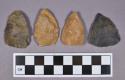 Chipped stone, three ovate projectile points and one scraper