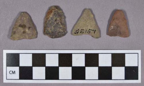 Chipped stone, triangular projectile points and one flake