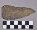 Chipped stone, projectile point, triangular, assymetrical