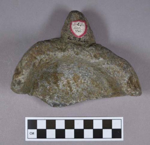 Groundstone, soapstone vessel fragments; includes one partial bowl fragment with handle